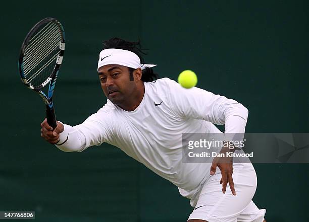 Leander Paes of India in action while playing with Radek Stepanek of the Czech Republic during their Gentlemen's Doubles third round match against...
