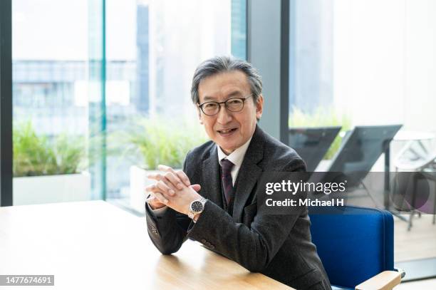 portrait of businessman in the modern office - michael sit stock pictures, royalty-free photos & images