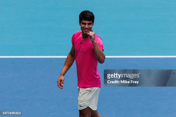 Carlos Alcaraz of Spain celebrates his victory over Tommy Paul of the United States in the fourth round of the men's singles at the Miami Open at the...