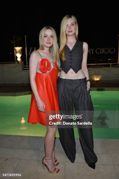 Dakota Fanning and Elle Fanning attend The Hollywood Reporter And Jimmy Choo Power Stylists Dinner at The Terrace at Sunset Tower on March 28, 2023...