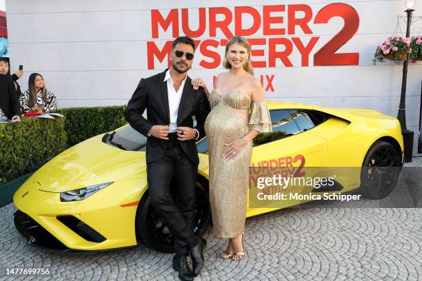 Julio Rocha and Karoline Kleine Buckstegge attend the Netflix Premiere of Murder Mystery 2 on March 28, 2023 in Los Angeles, California.