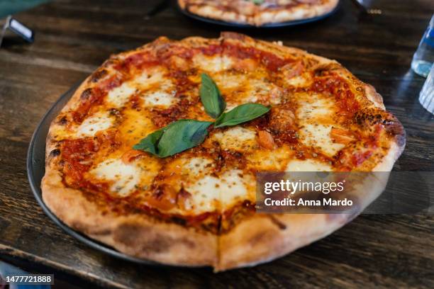 pizza margherita on a plate - cheese pizza stock pictures, royalty-free photos & images
