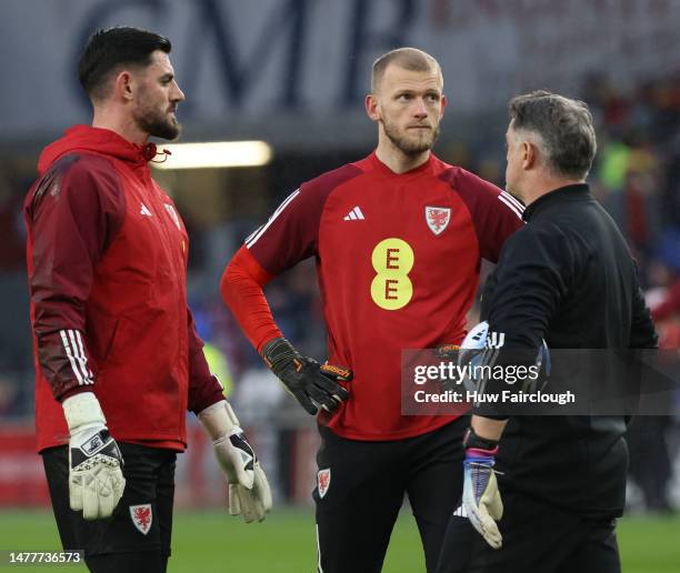 Goal Keepers Ben King and Adam Davies of Wales talk to the keeper coach ahead of the UEFA EURO 2024 qualifying round group D match between Wales and...