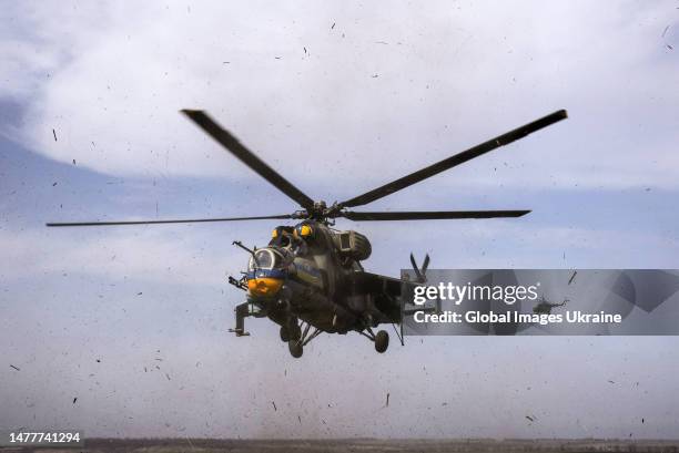 Mi-24 helicopter takes off for a combat mission against Russian forces on March 25, 2023 in Donetsk Oblast, Ukraine. Mi-8 and Mi-24 helicopters are...
