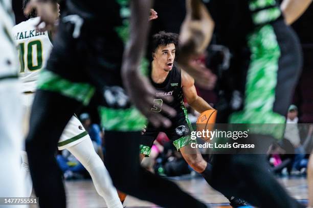 Blaze Nield of the Utah Valley Wolverines looks on against the UAB Blazers in the second half of a semifinal game of the NIT basketball tournament at...