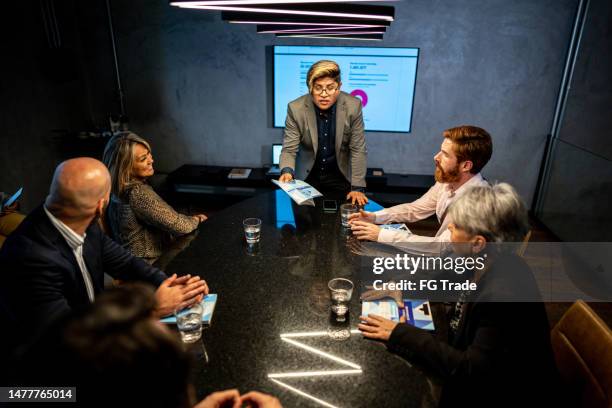 anger businessman talking in a meeting at the office - deadline contenders stock pictures, royalty-free photos & images