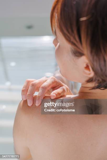 woman enjoy take a bath in hot tub - human skin back stock pictures, royalty-free photos & images