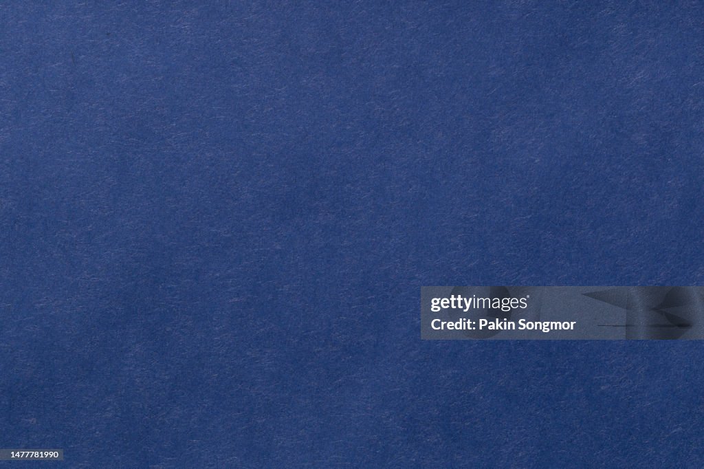 Blue paper sheet texture cardboard background.