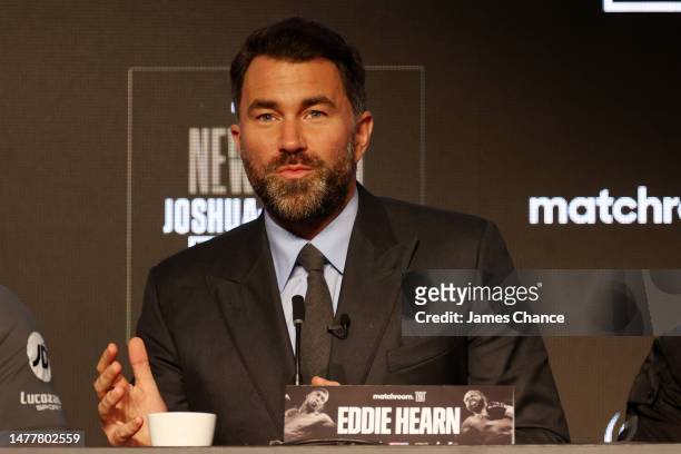 Promoter Eddie Hearn speaks during the main event press conference at Nobu London on March 29, 2023 in London, England. The boxing match between...