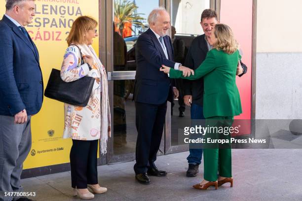 The First Vice President and Minister of Economic Affairs and Digital Transformation, Nadia Calviño, greets the President of the RAE, Santiago Muñoz,...