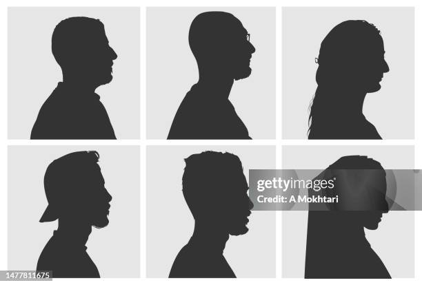 silhouette portrait in profile on a gray background. - headshot gray background stock illustrations