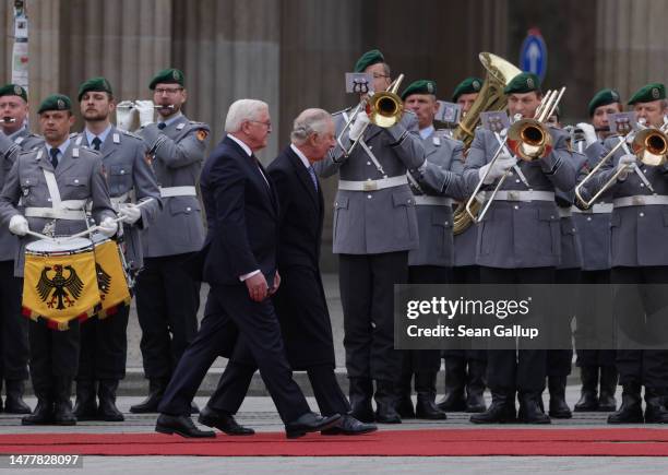 German President Frank-Walter Steinmeier and King Charles III review a gaud of honour at the ceremonial welcome for the King and Camilla - Queen...