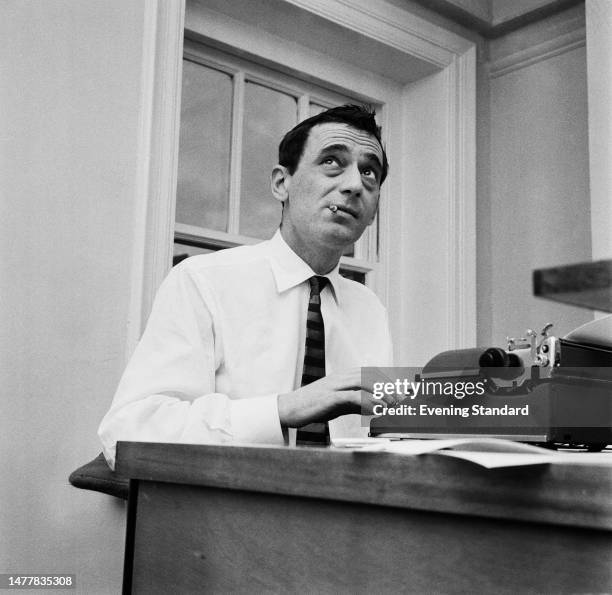 Playwright Willis Hall working at his typewriter, January 21st, 1960.