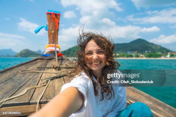 selfie of cheerful woman traveling with thai taxi boat - navio de passageiros imagens e fotografias de stock