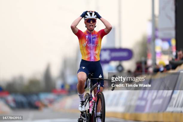 Demi Vollering of The Netherlands and Team SD Worx celebrates at finish line as race winner during the 11th Dwars door Vlaanderen 2023 - Women's...