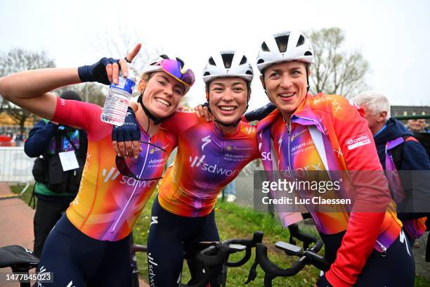 Race winner Demi Vollering of The Netherlands and Team SD Worx celebrates with her teammates Mischa Bredewold of The Netherlands and Marlen Reusser...