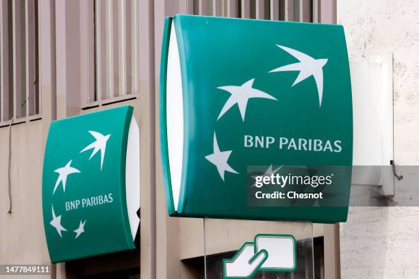 The logo of French bank BNP Paribas is seen on the facade of a branch on March 29, 2023 in Paris, France. Societe Generale, BNP Paribas, Exane,...