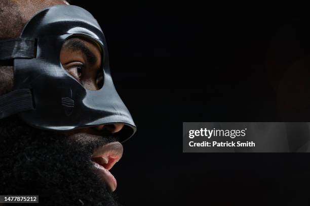 Jaylen Brown of the Boston Celtics looks on as he wears a protective face-mask against the Washington Wizards at Capital One Arena on March 28, 2023...