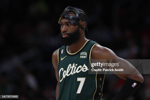 Jaylen Brown of the Boston Celtics in action as he wears a protective face-mask against the Washington Wizards at Capital One Arena on March 28, 2023...