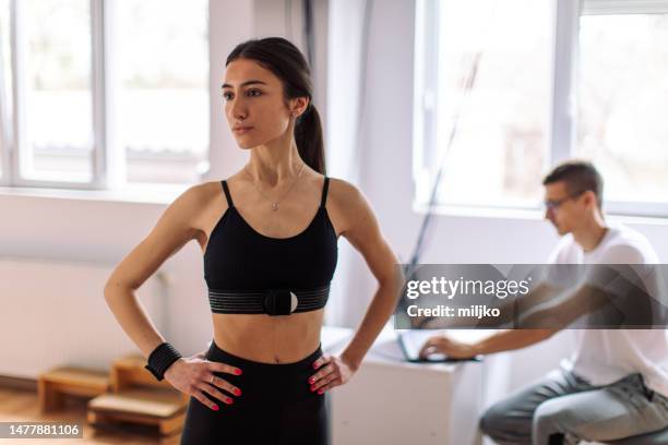 working with patient in modern scoliosis clinic from analysis to exercise - biomedical animation stock pictures, royalty-free photos & images