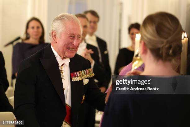 King Charles III attends a state banquet at Schloss Bellevue presidential palace on March 29, 2023 in Berlin, Germany. The King and The Queen...