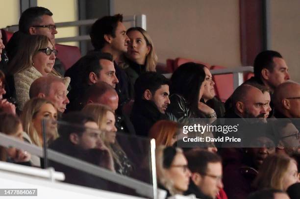 Mikel Arteta, Manager of Arsenal and Edu Gaspar, Sporting Director of Arsenal look on during the UEFA Women's Champions League quarter-final 2nd leg...