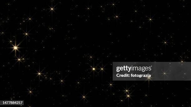 starry sky abstract golden background - resplandeciente fotografías e imágenes de stock
