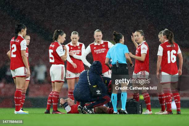 Kim Little of Arsenal receives medical treatment during the UEFA Women's Champions League quarter-final 2nd leg match between Arsenal and FC Bayern...