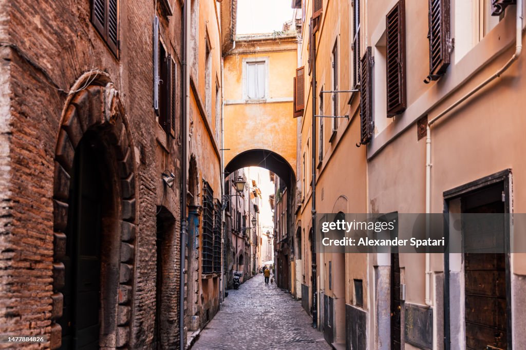 Narrow alley with arch in Campo di Fiori neighbourhood, Rome, Italy