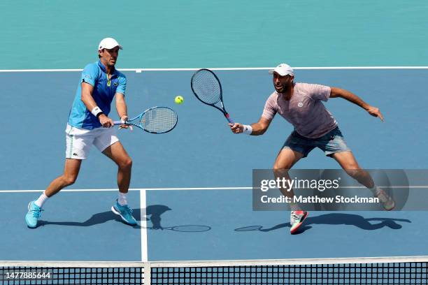 Edauard Roger-Vasselin of France and Santiago Gonzalez of Mexico play Wesley Koolhof of Netherlands and Neal Skupski of Great Britain during the...
