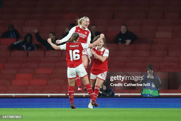 Stina Blackstenius of Arsenal celebrates with teammates Noelle Maritz and Victoria Pelova after scoring the team's second goal during the UEFA...