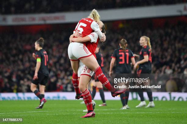 Stina Blackstenius of Arsenal celebrates with teammate Katie McCabe after scoring the team's second goal during the UEFA Women's Champions League...