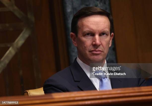 Sen. Chris Murphy listens as Secretary of Homeland Security Alejandro Mayorkas testifies before the Senate Appropriations Committee on March 29, 2023...
