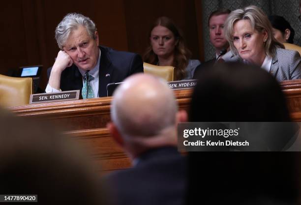 Sen. John Kennedy and Sen. Cindy Hyde-Smith listen as Secretary of Homeland Security Alejandro Mayorkas testifies before the Senate Appropriations...