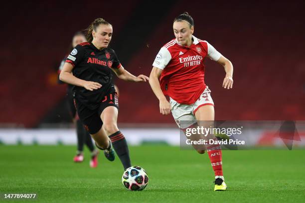 Georgia Stanway of FC Bayern Munich battles for possession with Caitlin Foord of Arsenal during the UEFA Women's Champions League quarter-final 2nd...