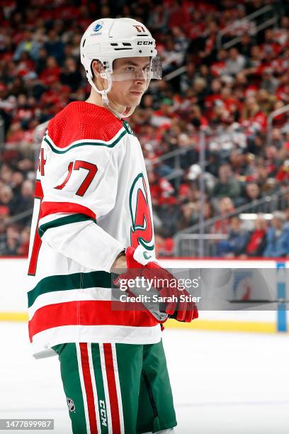 Yegor Sharangovich of the New Jersey Devils looks on during the first period against the Ottawa Senators at Prudential Center on March 25, 2023 in...