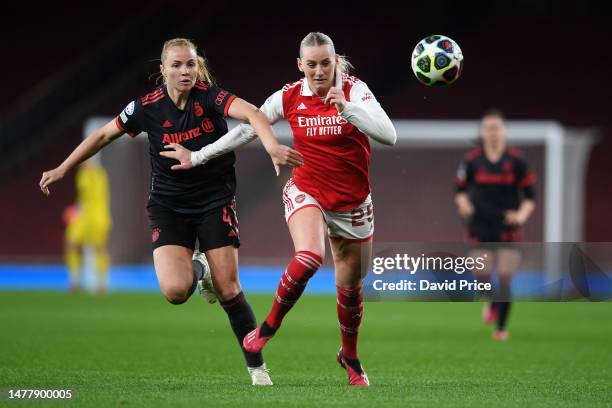 Stina Blackstenius of Arsenal is challenged by Glodis Viggosdottir of FC Bayern Munich during the UEFA Women's Champions League quarter-final 2nd leg...