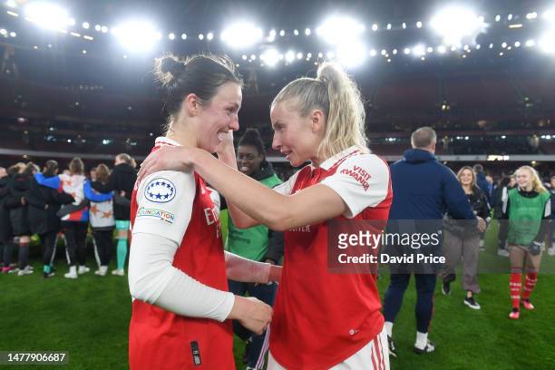 Lotte Wubben-Moy and Leah Williamson of Arsenal celebrate their win following the UEFA Women's Champions League quarter-final 2nd leg match between...