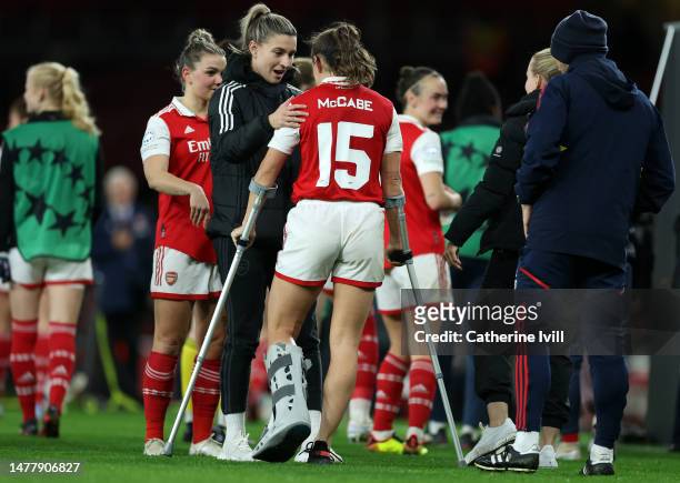 Katie McCabe of Arsenal speaks with teammate Steph Catley following the UEFA Women's Champions League quarter-final 2nd leg match between Arsenal and...
