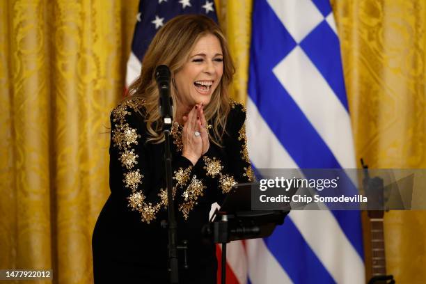 Actor Rita Wilson sings during a reception celebrating Greek Independence Day hosted by U.S. President Joe Biden in the East Room of the White House...