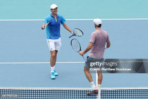 Edauard Roger-Vasselin of France and Santiago Gonzalez of Mexico celebrate match point against Wesley Koolhof of Netherlands and Neal Skupski of...