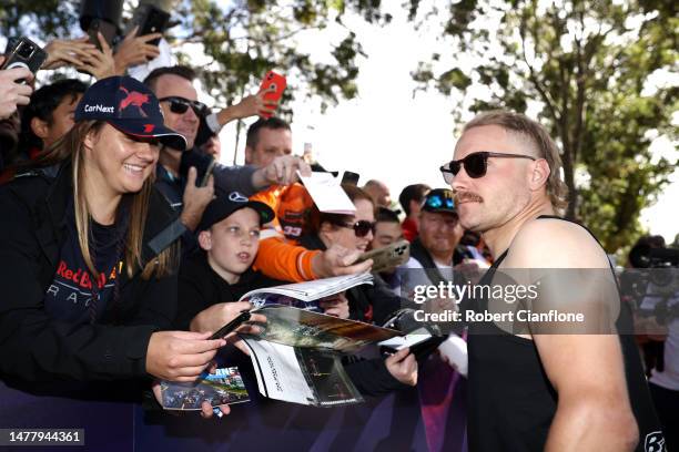 Valtteri Bottas of Finland and Alfa Romeo F1 greets fans at the Melbourne Walk during previews ahead of the F1 Grand Prix of Australia at Albert Park...