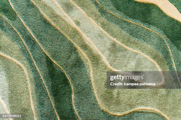 full frame shot of green rug - damaged carpet stock pictures, royalty-free photos & images