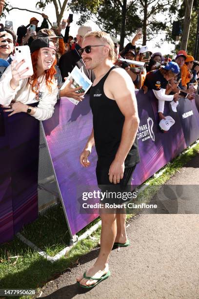 Valtteri Bottas of Finland and Alfa Romeo F1 greets fans at the Melbourne Walk during previews ahead of the F1 Grand Prix of Australia at Albert Park...