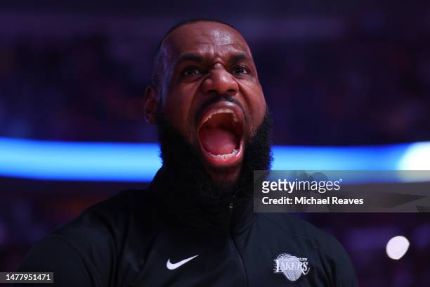 LeBron James of the Los Angeles Lakers reacts prior to the game against the Chicago Bulls at United Center on March 29, 2023 in Chicago, Illinois....