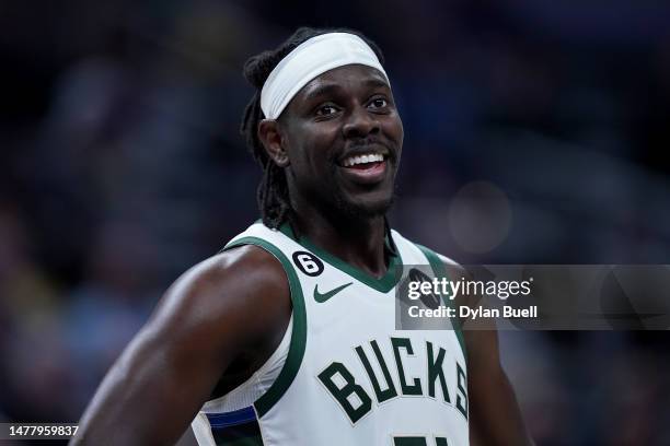Jrue Holiday of the Milwaukee Bucks looks on in the fourth quarter against the Indiana Pacers at Gainbridge Fieldhouse on March 29, 2023 in...