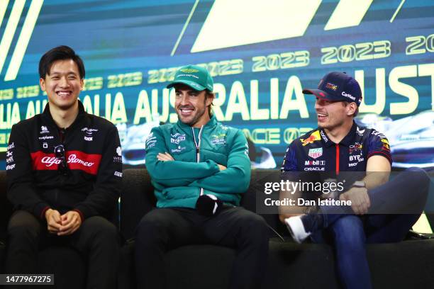 Zhou Guanyu of China and Alfa Romeo F1, Fernando Alonso of Spain and Aston Martin F1 Team and Max Verstappen of the Netherlands and Oracle Red Bull...