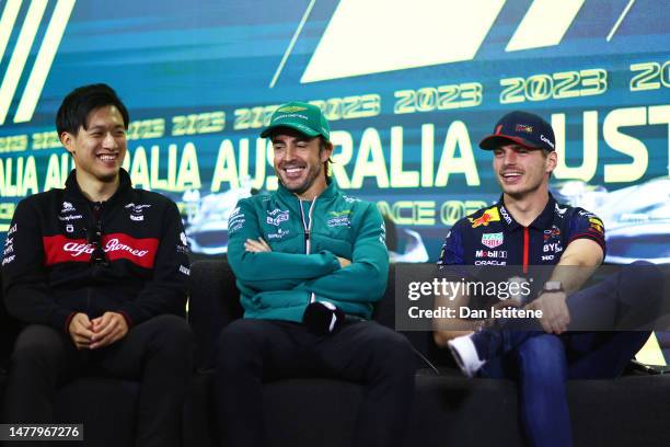 Zhou Guanyu of China and Alfa Romeo F1, Fernando Alonso of Spain and Aston Martin F1 Team and Max Verstappen of the Netherlands and Oracle Red Bull...