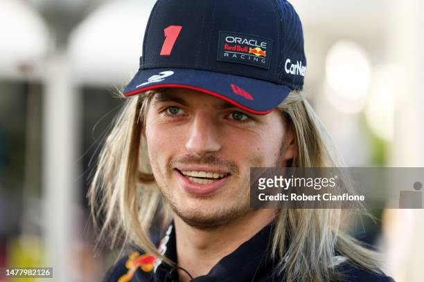 Max Verstappen of the Netherlands and Oracle Red Bull Racing wears a blonde wig in the Paddock during previews ahead of the F1 Grand Prix of...