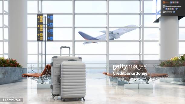 airport waiting area with luggages, empty seats and blurred background - luchthaven stockfoto's en -beelden